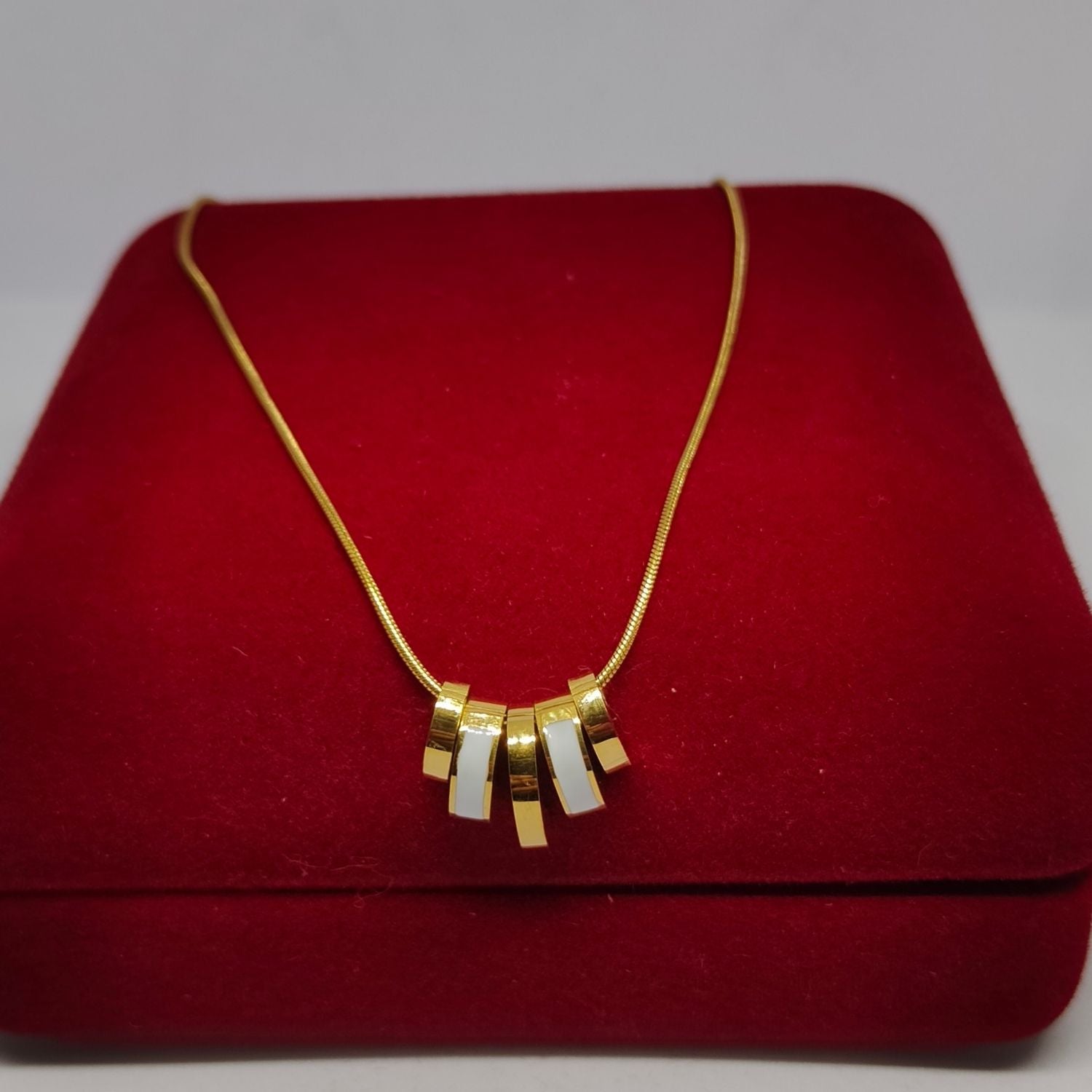 Modern Gold-Tone Multi-Ring Pendant Necklace