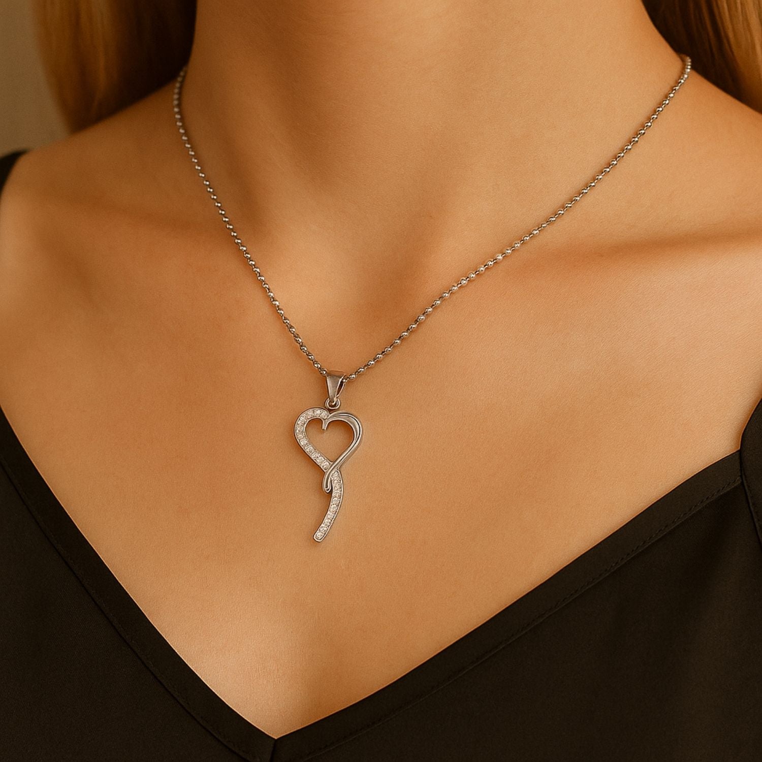 Twisted Heart Crystal Pendant – Where Emotion Meets Elegance