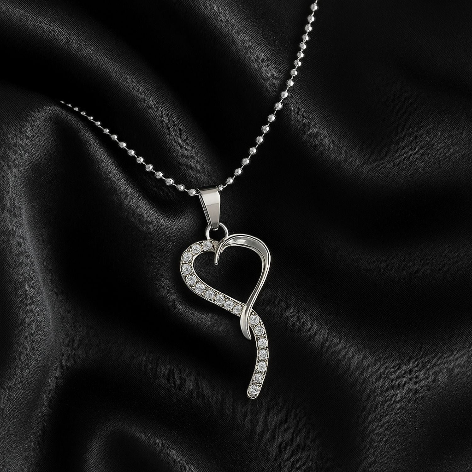 Twisted Heart Crystal Pendant – Where Emotion Meets Elegance