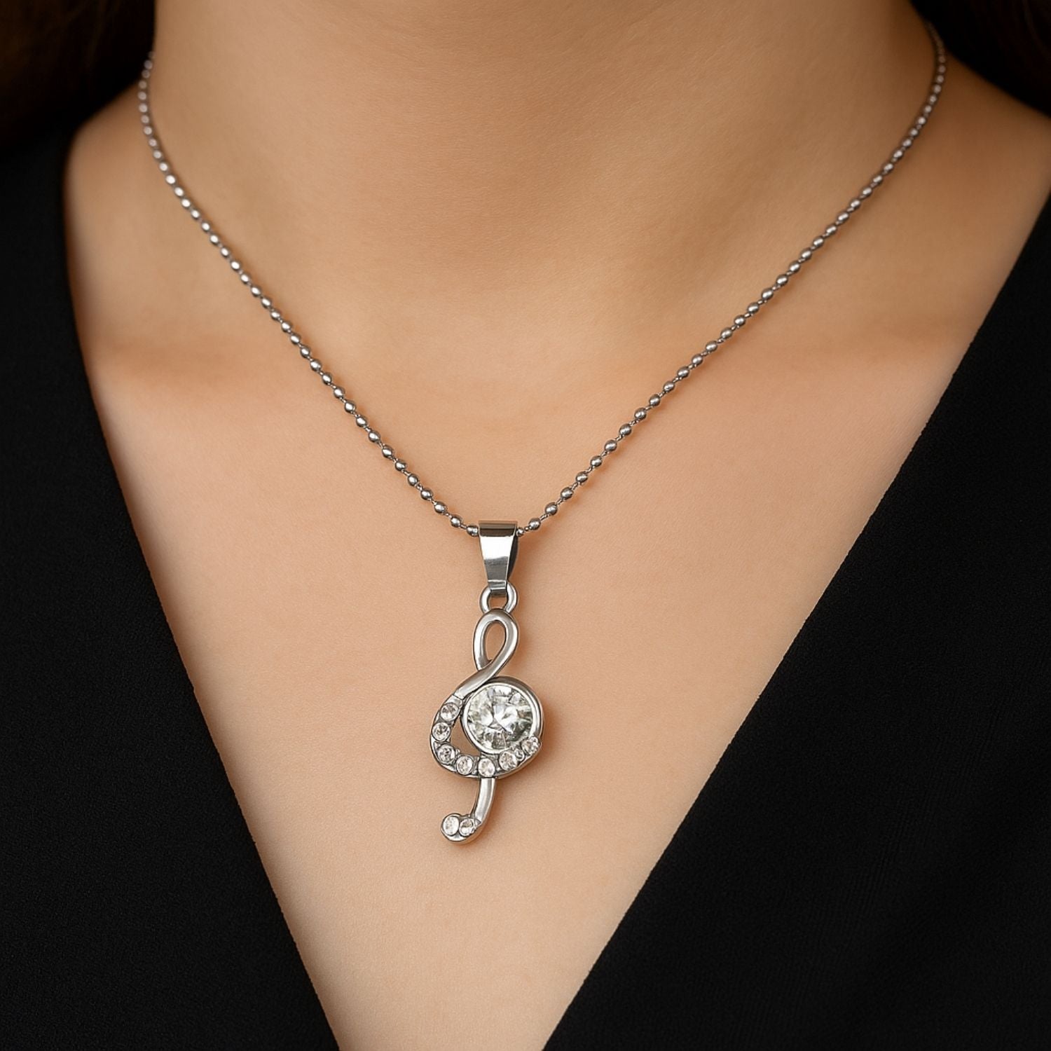 Melody in Silver – Crystal Treble Clef Pendant