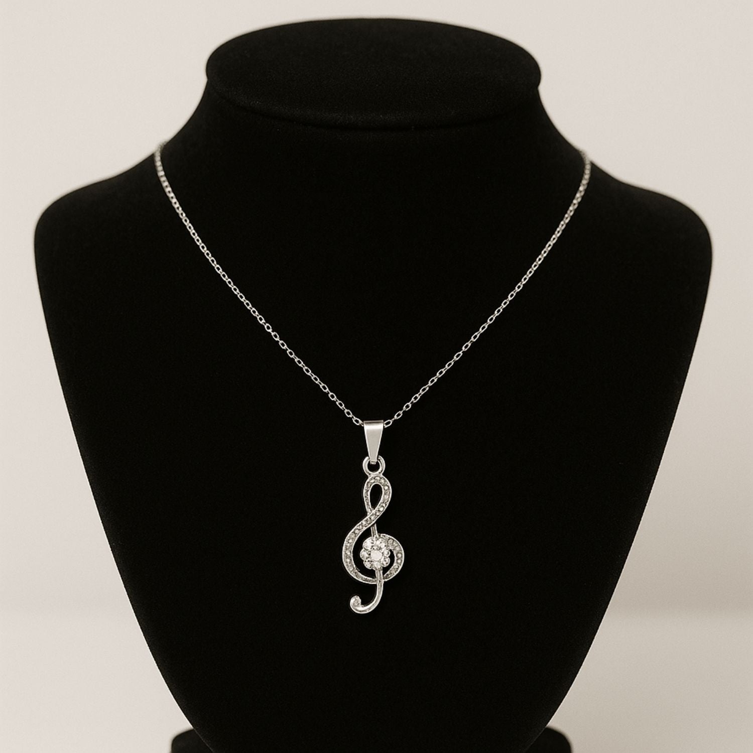 Melody in Silver – Crystal Treble Clef Pendant
